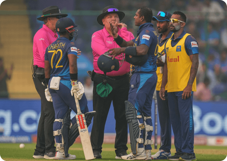 Umpires talking to players