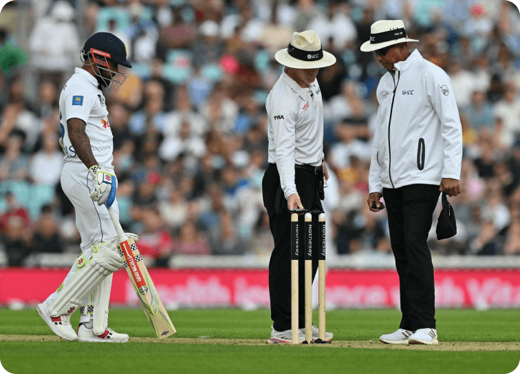 Cricket umpire at stumps